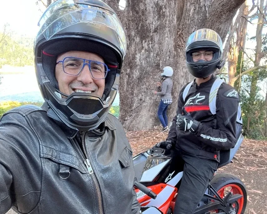 Rafael on his motorcycle with a friend