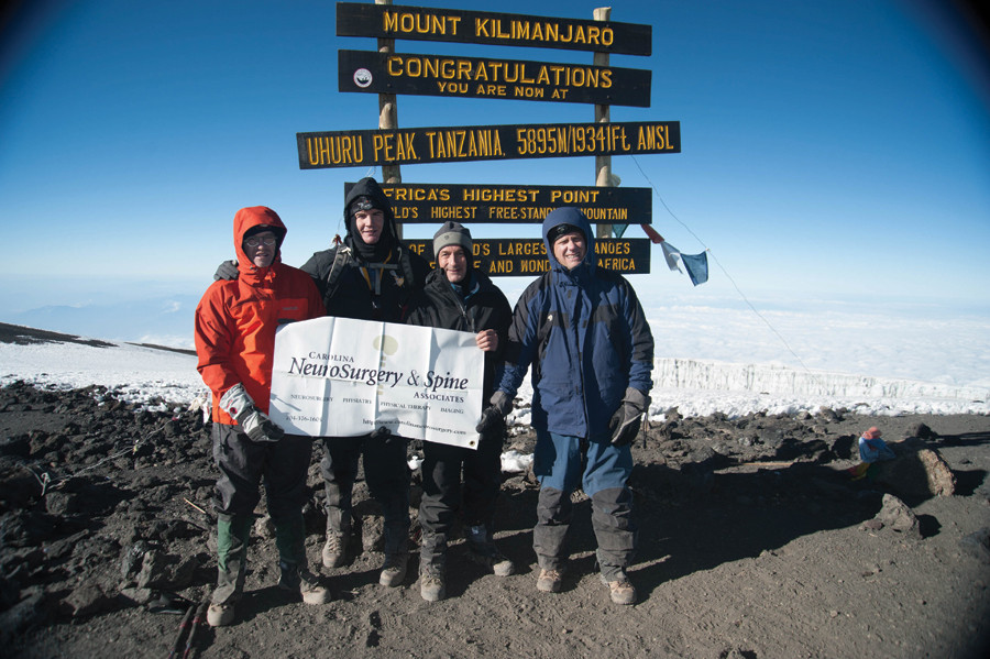 Neurosurgeons climbing mountain