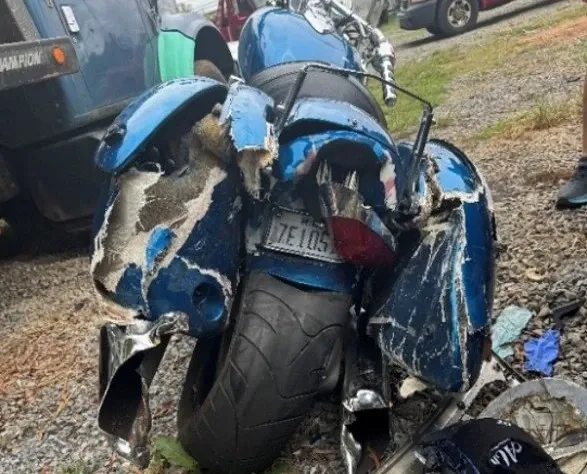 An image of Rafael's wrecked motorcycle, showing the extent of the crash damage